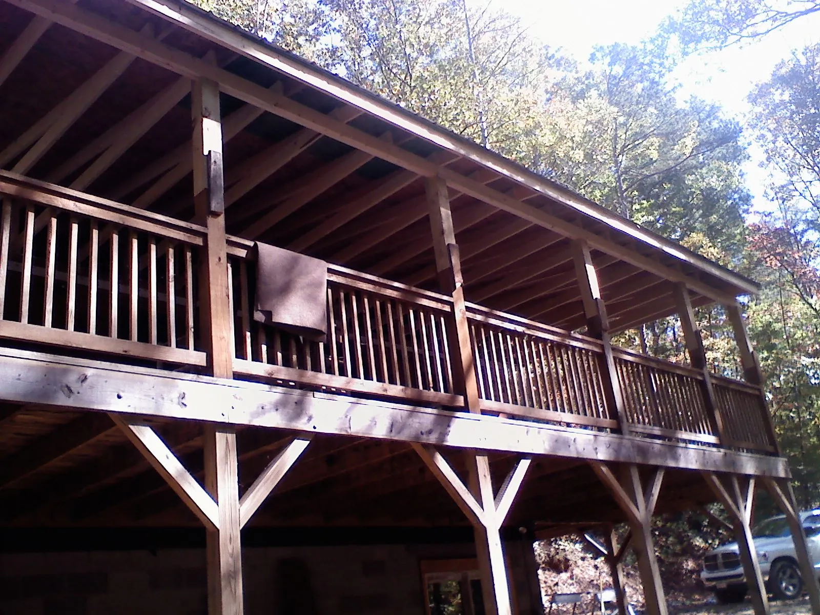 Timber framing under a new elevated porch and deck — Roof Leak Repair in Grace by Roofing Brothers